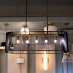 Люстра подвесная овальной формы с металлическим решетчатым абажуром матово-черного цвета и 5 лампами Kichler варинант исполнения - 7 | Loft Concept в Ульяновске